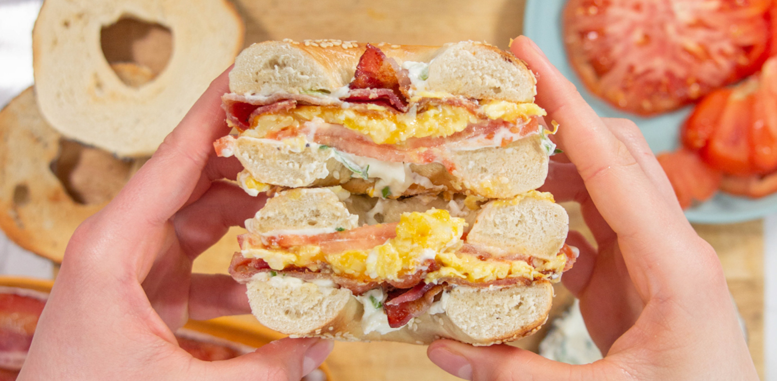 Bagel with quail eggs and bacon