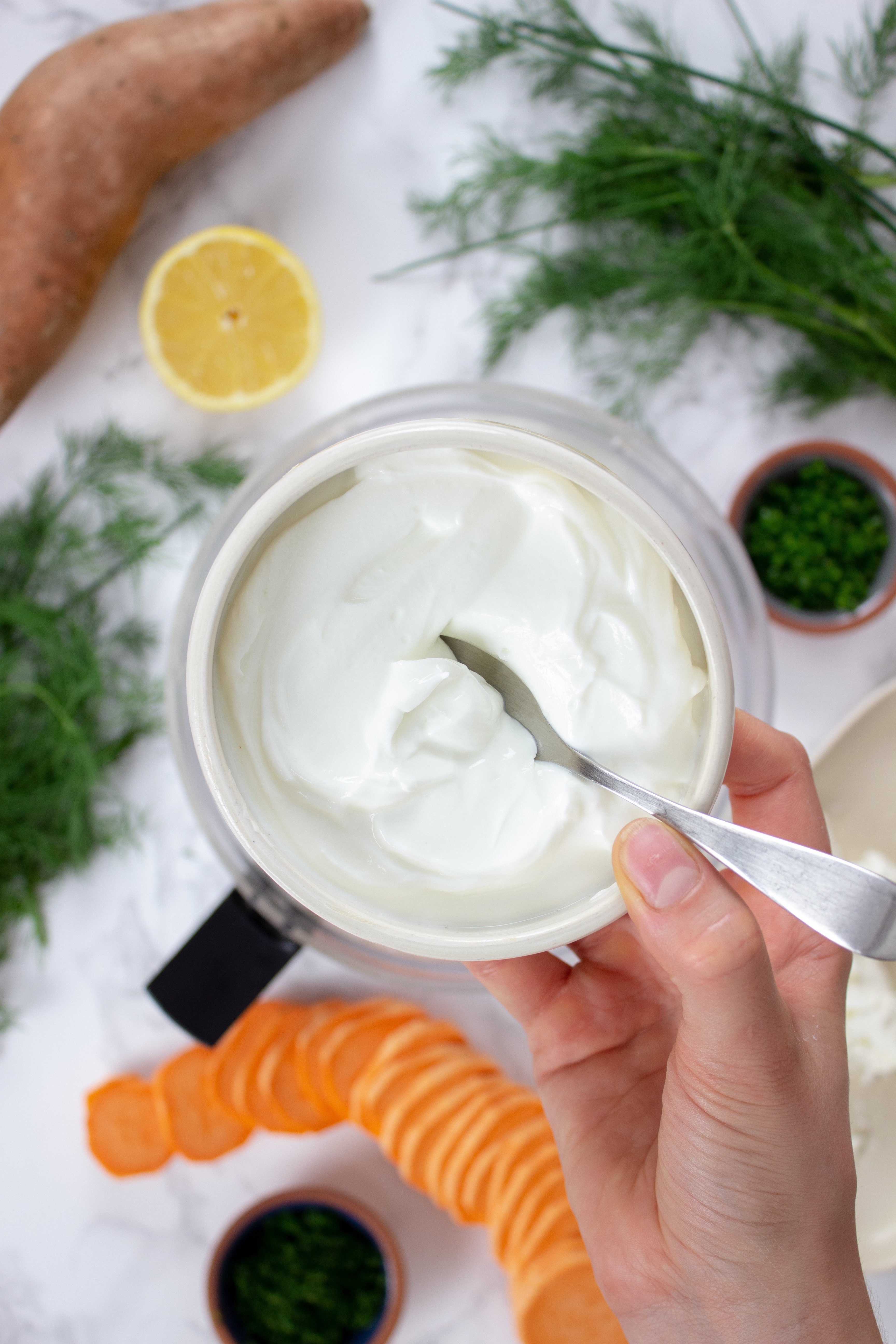 Whipped feta in bowl with spoon