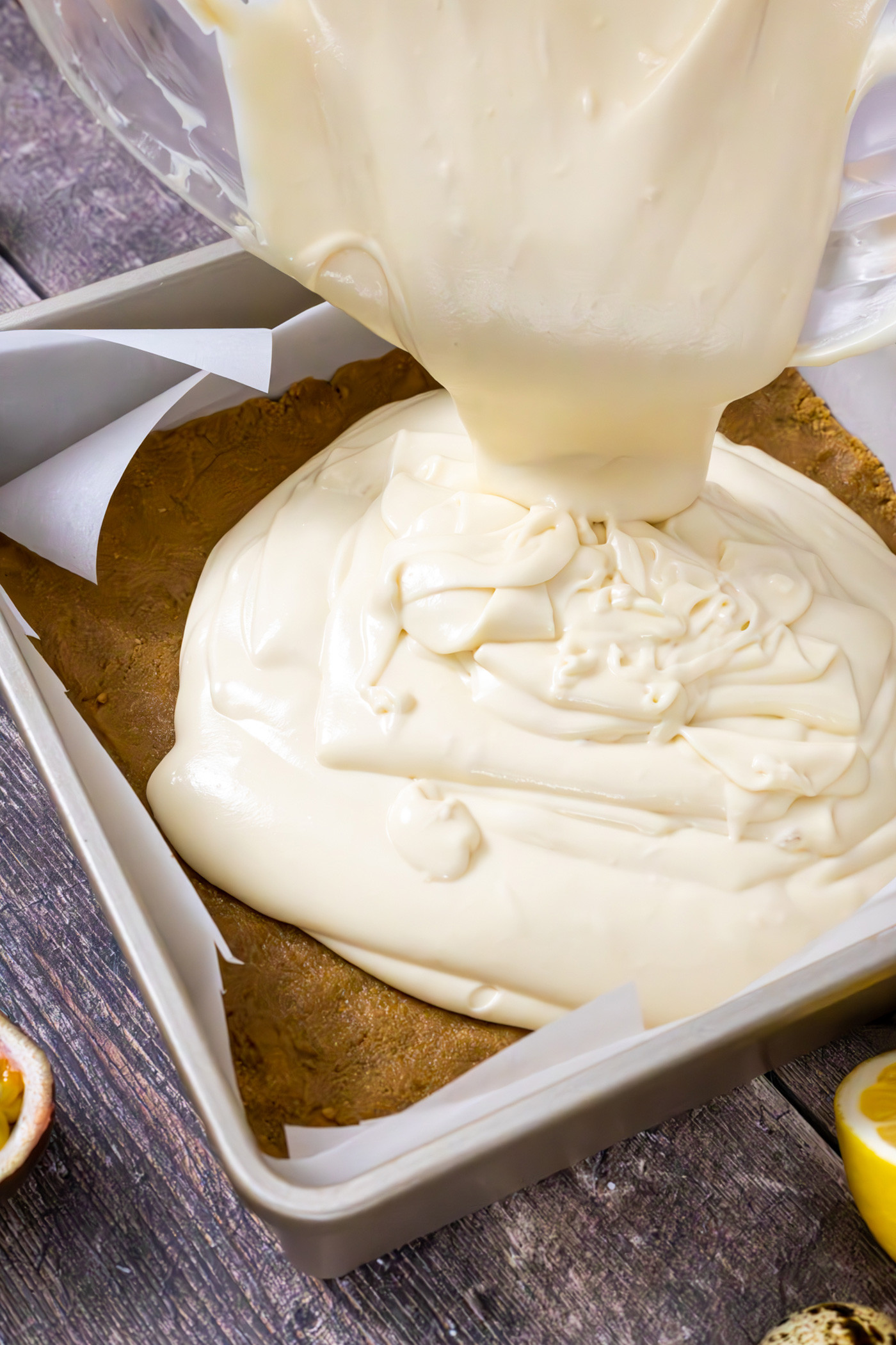 Pouring-cheesecake-into-pan