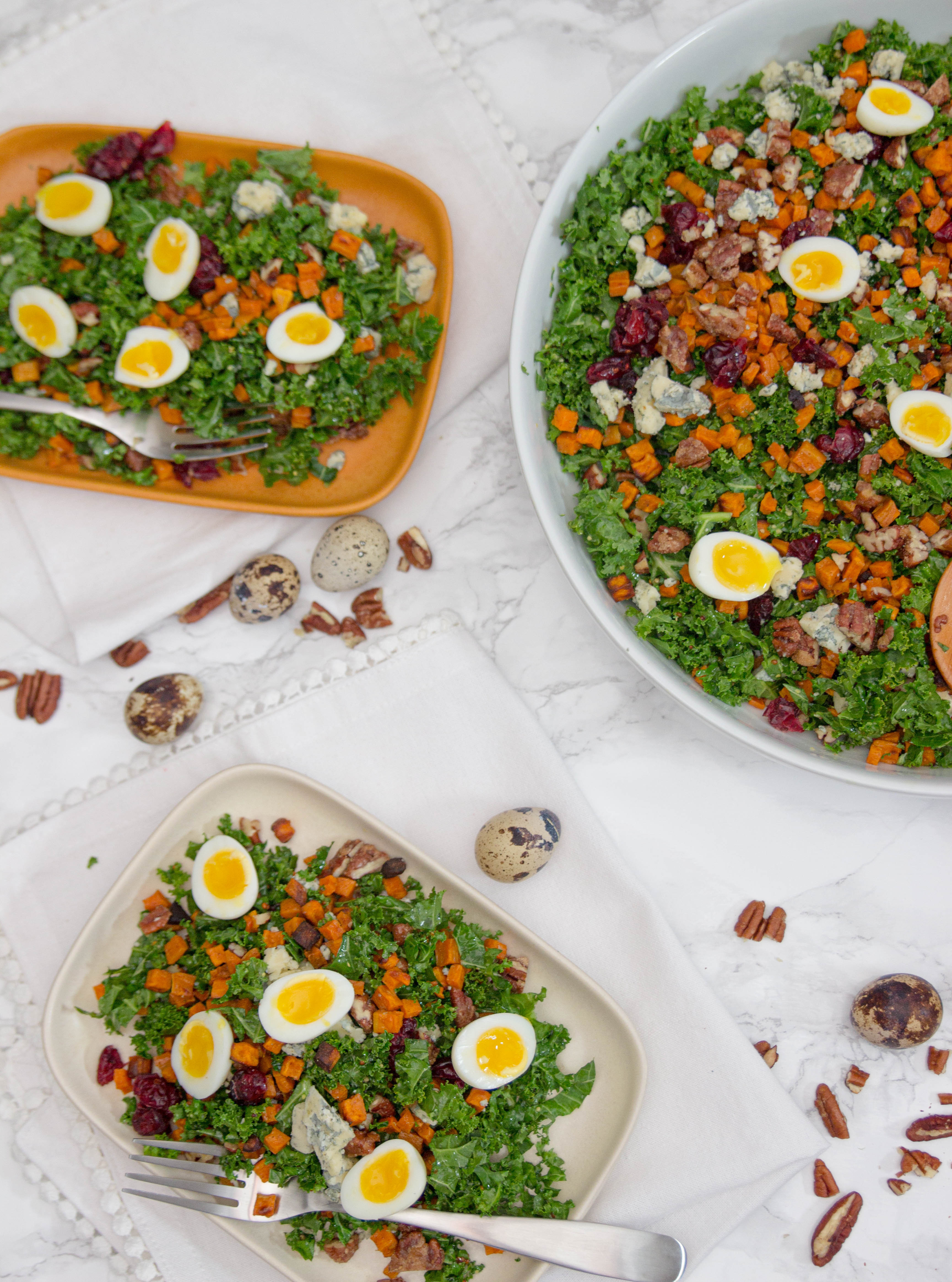 three salads with quail eggs
