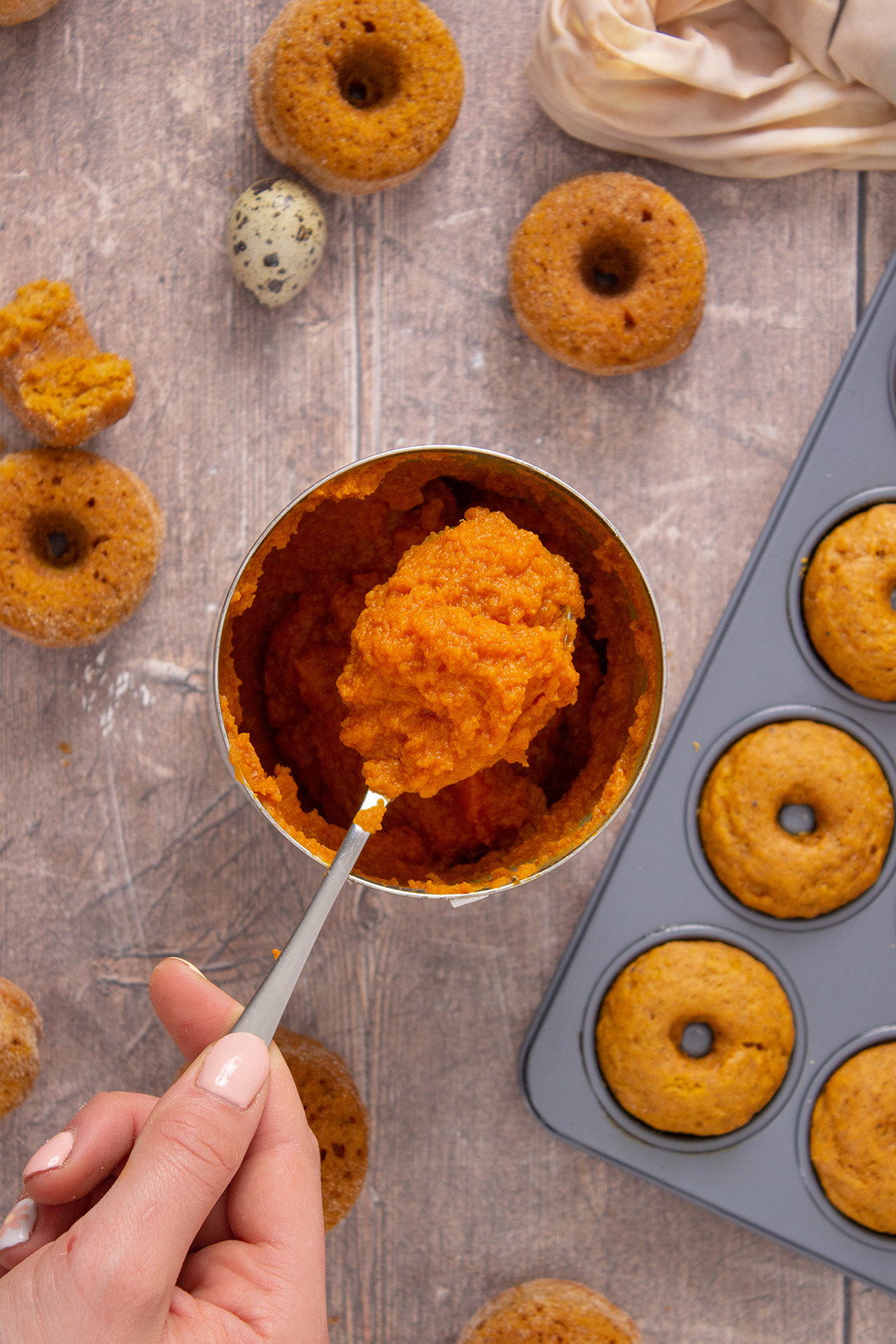 baked pumpkin doughnuts with can of pumpkin