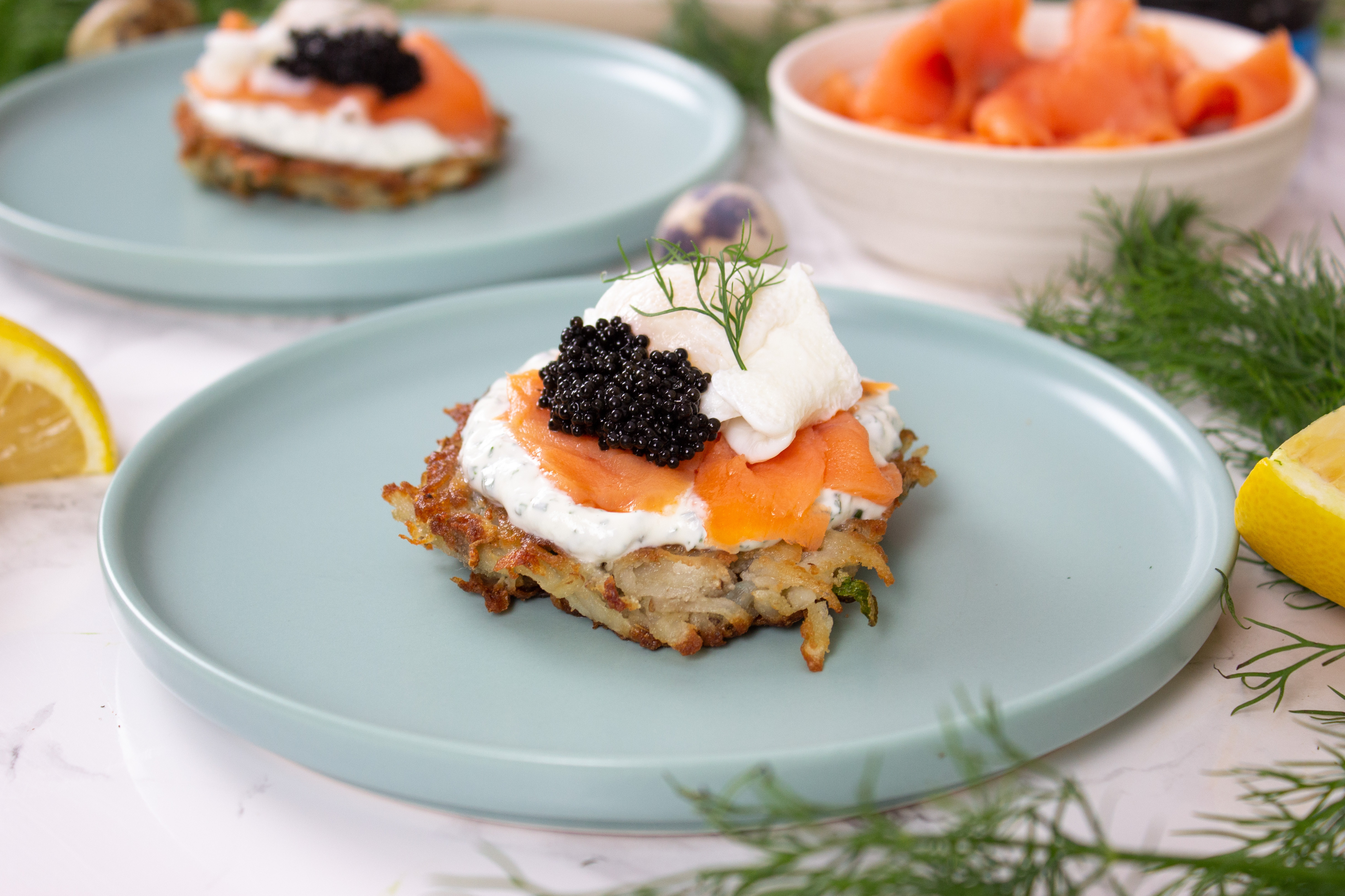 Potato Latkes with Poached Quail Eggs, Lemon Dill Crème Fraîche and Caviar