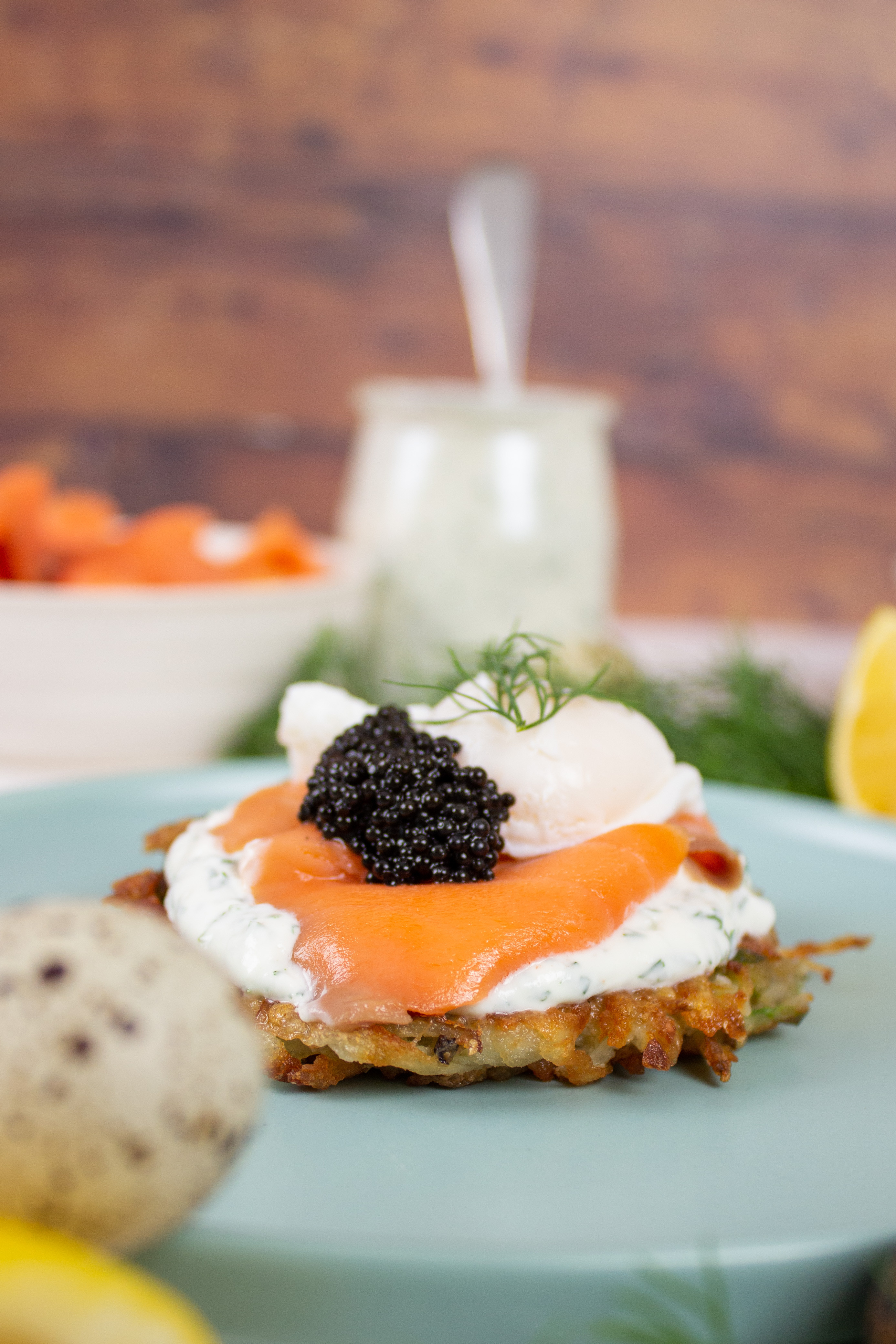 Potato Latkes with Poached Quail Eggs, Lemon Dill Crème Fraîche and Caviar